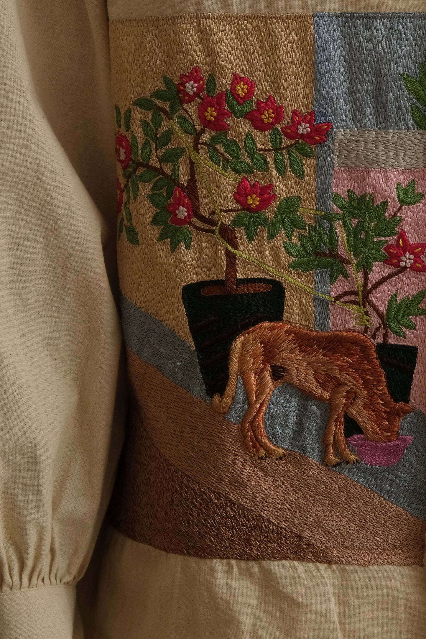 close up of documented hand-embroidered shirt, wearable art in unbleached cotton. Documentary style hand embroidery.  Silver Buttons. Latin Quarters. Archival Clothing. Image to Textile. Mix Media.