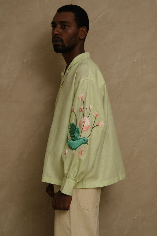 Hiral Parind silk shirt with bird embroidery and pearl buttons, wearable art