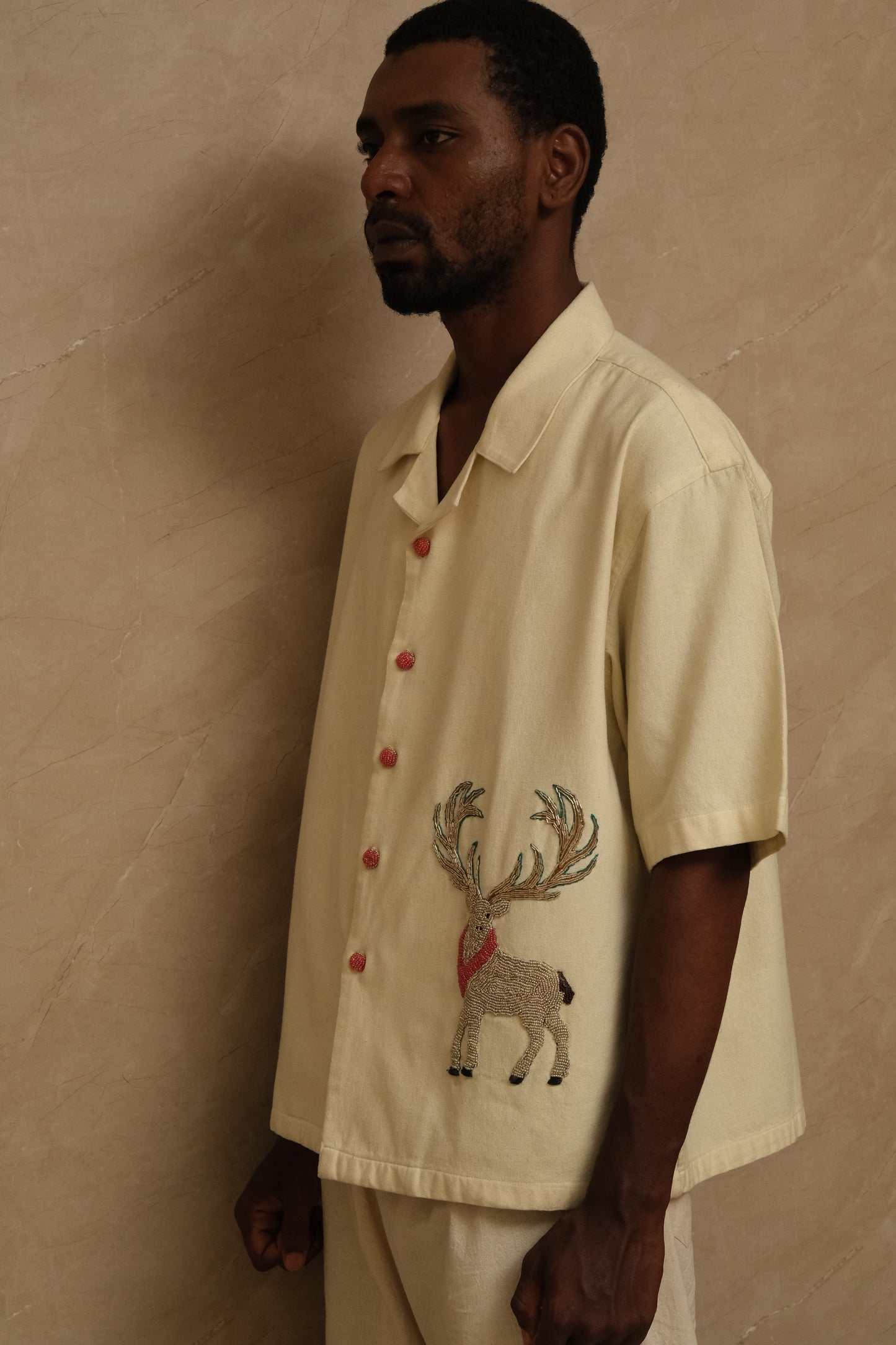 Barasingha one of one hand embroidered art shirt featuring wildlife inspired textile storytelling, intricate threadwork, and slow crafted collector focused wearable artwork