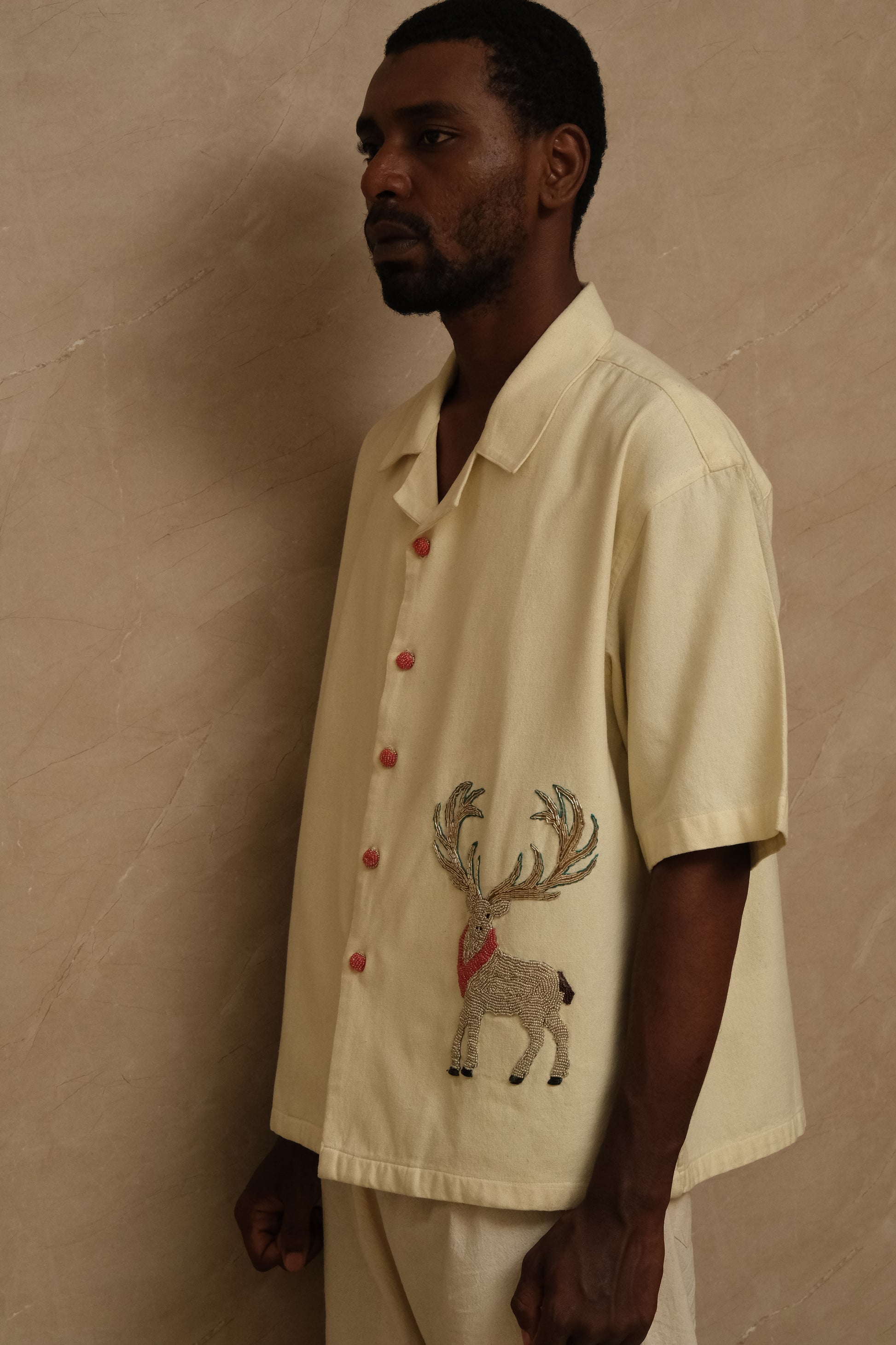 Barasingha one of one hand embroidered art shirt featuring wildlife inspired textile storytelling, intricate threadwork, and slow crafted collector focused wearable artwork