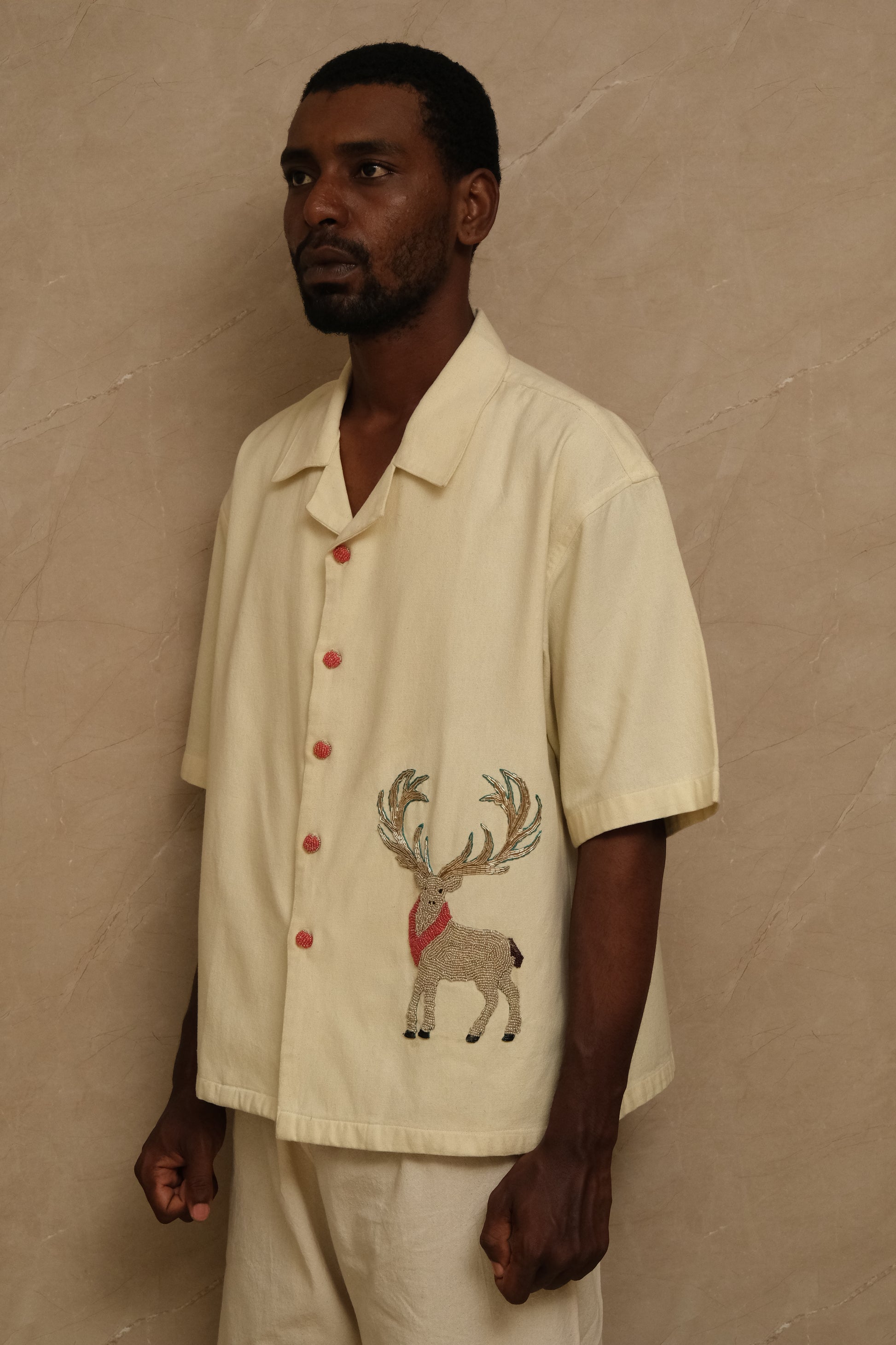 Editorial image of the Barasingha wearable artwork featuring hand embroidery, textured textile composition, and archival inspired craftsmanship shaped into collector artwear