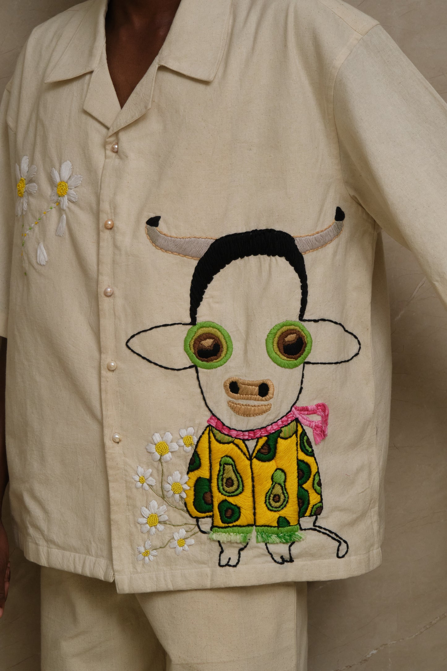 Gudda one of one hand embroidered art shirt crafted in textured cotton featuring intricate threadwork, artisanal embroidery, and collector focused wearable textile artwork