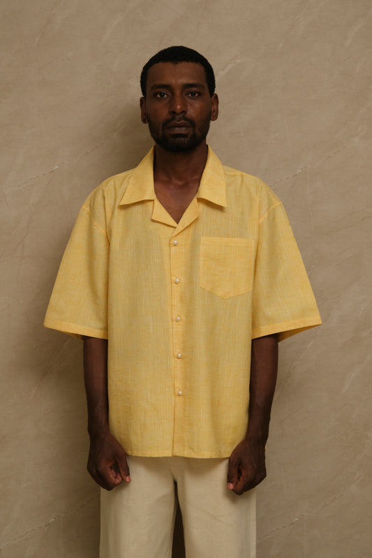 Mango one of one linen artwear shirt featuring natural pearl buttons, handcrafted textile construction, and slow crafted collector focused wearable artwork
