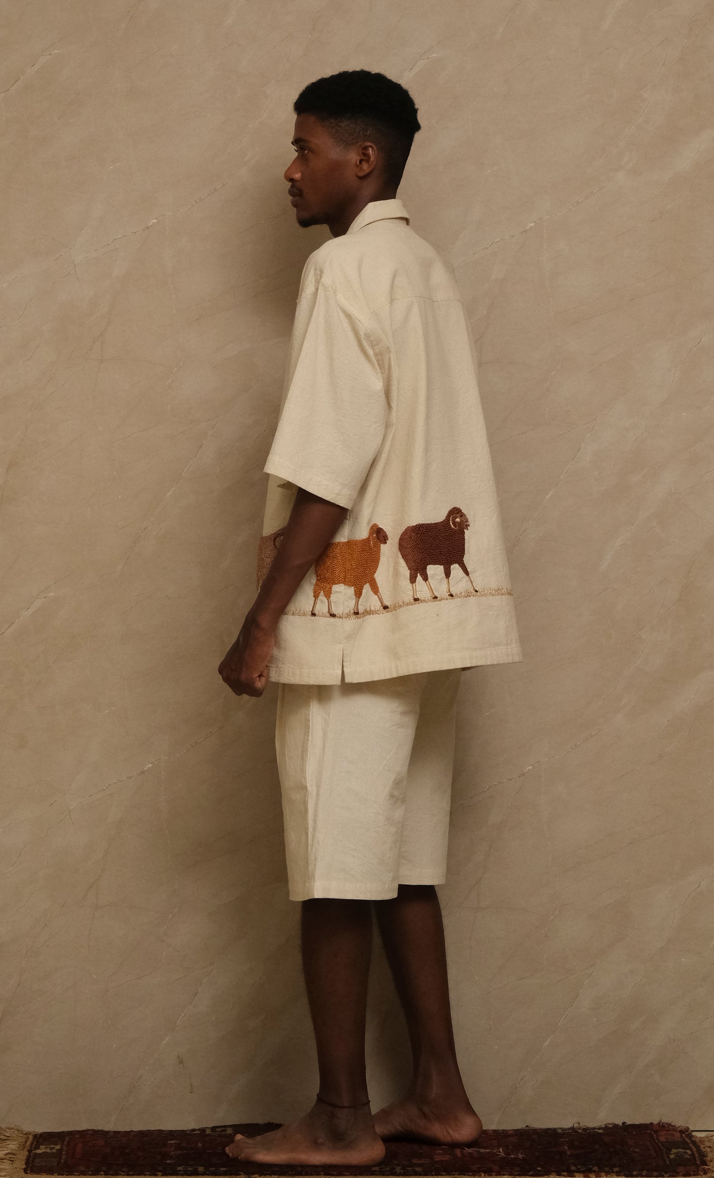 Editorial photograph of the Sambhar 2.0 wearable artwork highlighting detailed embroidery, hand ornamentation, archival textile construction, and one of one collector focused craftsmanship