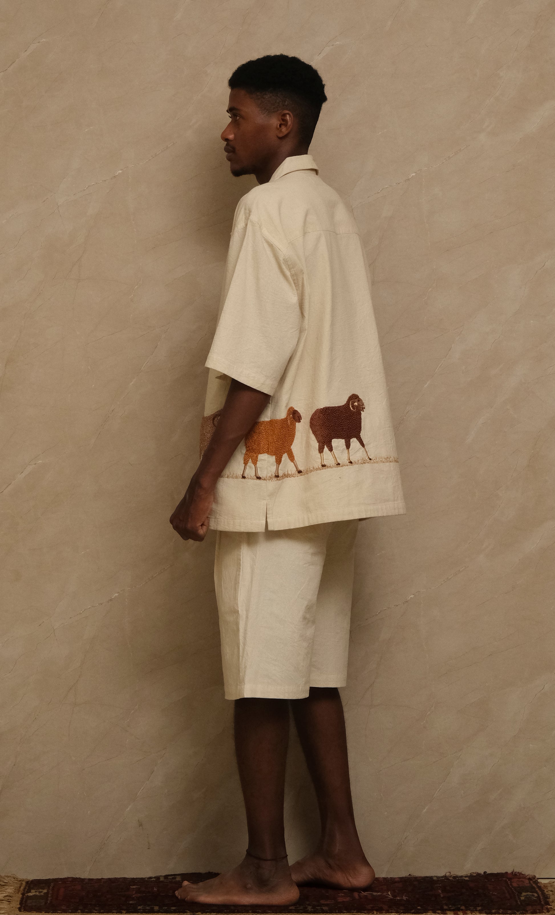 Editorial photograph of the Sambhar 2.0 wearable artwork highlighting detailed embroidery, hand ornamentation, archival textile construction, and one of one collector focused craftsmanship