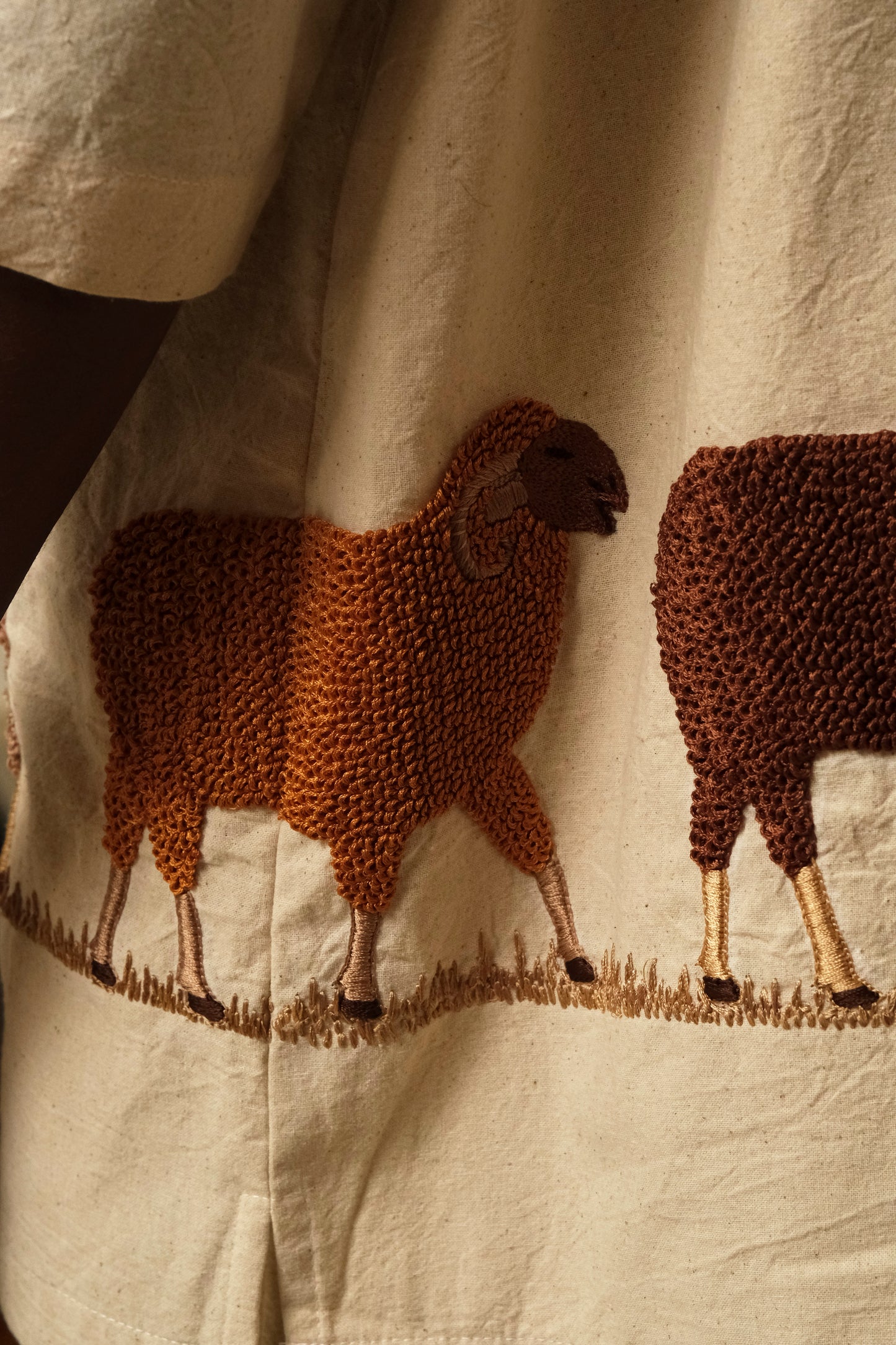 Garlic Moon Sambhar 2.0 wearable textile artwork combining hand embroidery, pastoral references, artisanal construction, and archival collector focused design language