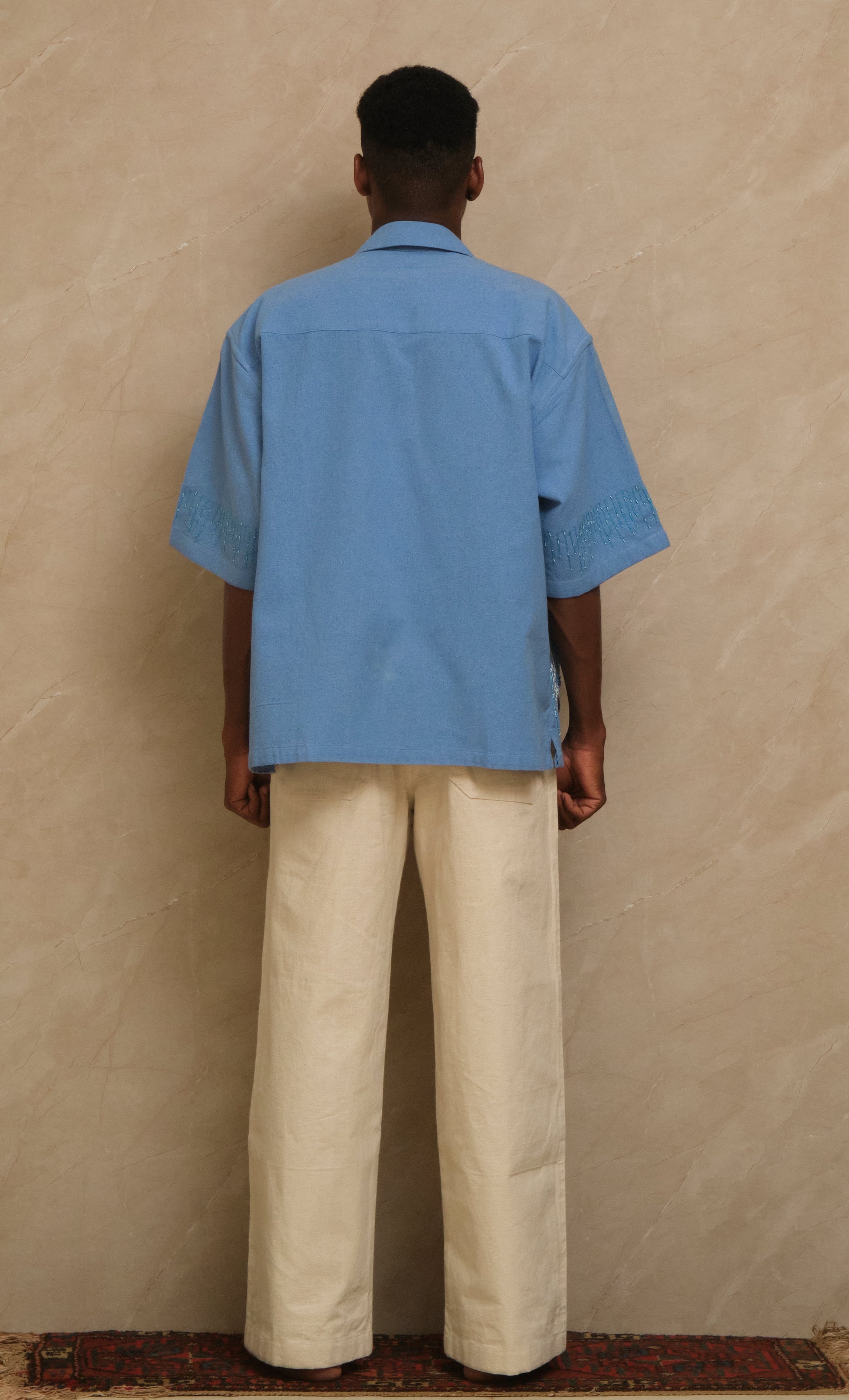 One of one The Ocean embroidered collector shirt exploring marine movement, handcrafted textile storytelling, and intricate surface detailing through slow crafted wearable art